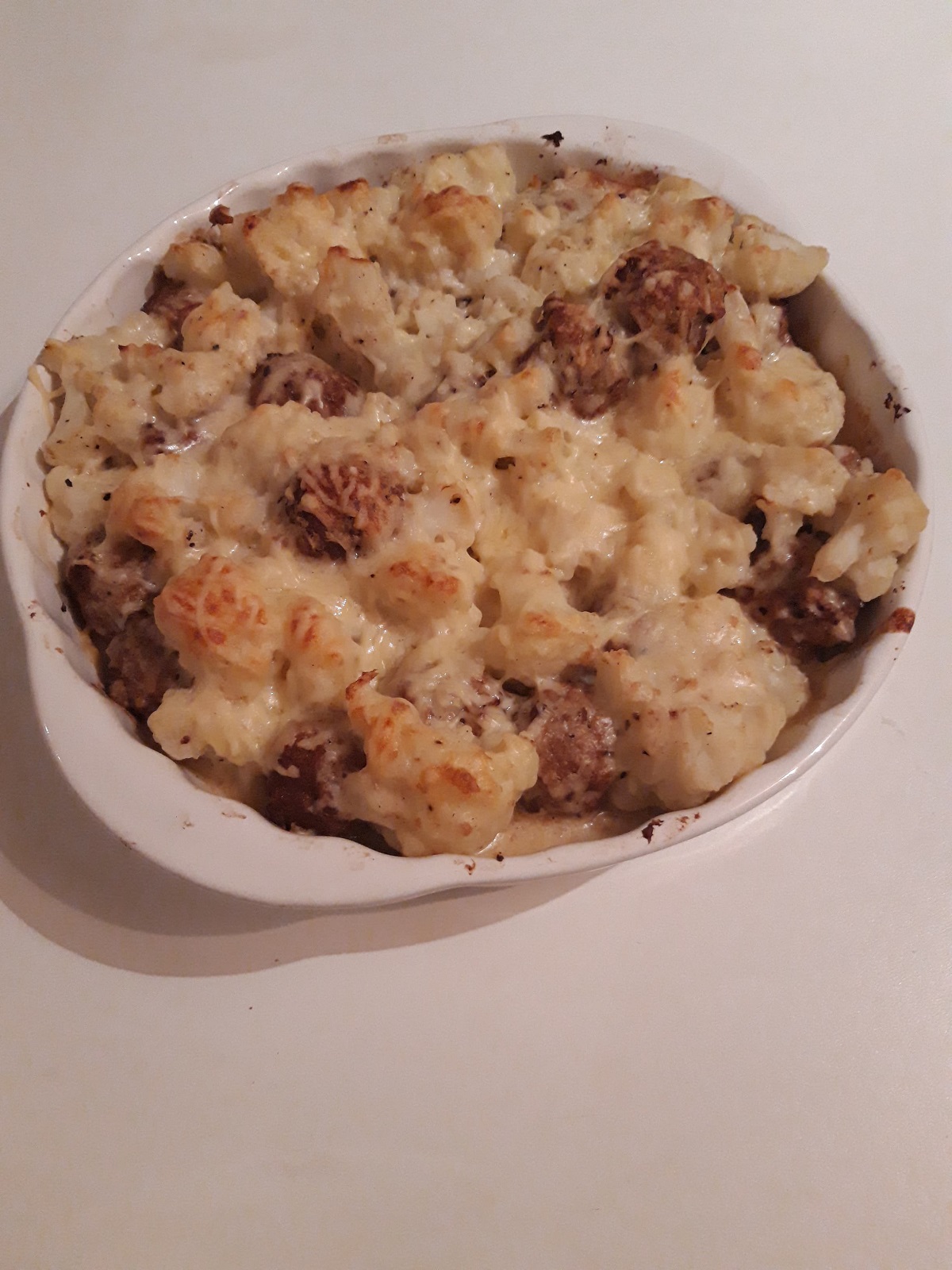 Bloemkool ovenschotel met kaas & veggie balletjes